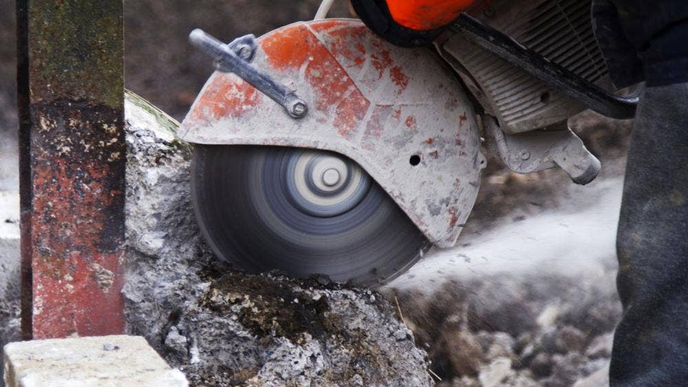 Grinder in use on concrete