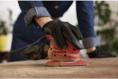 Detail Sander Being Used On Wood